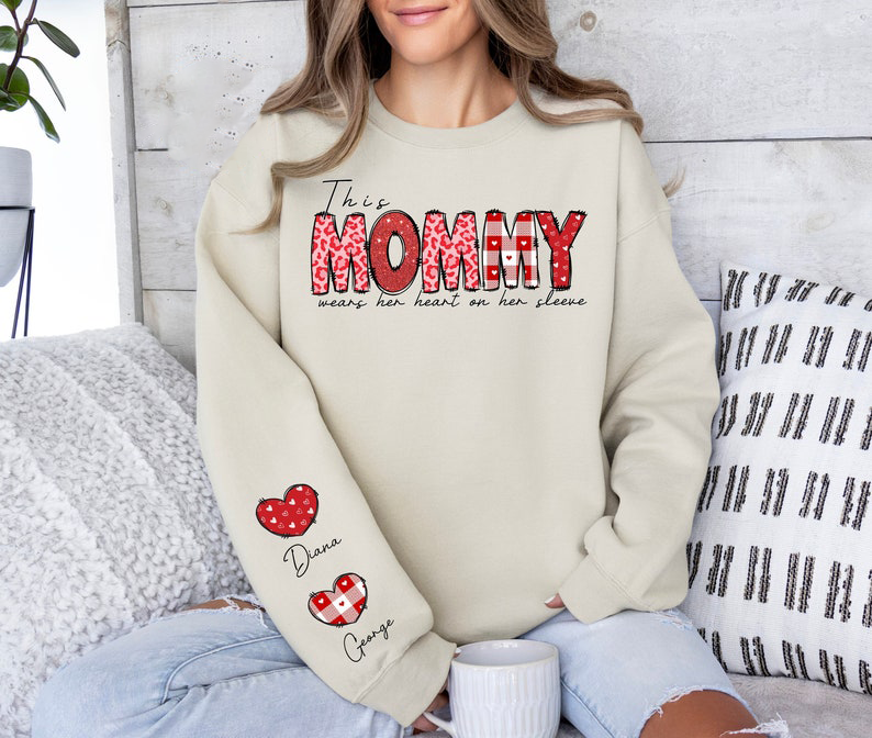 Custom This Mom Wears Her Heart On Her Sleeve Sweatshirt, Shirt with Names On Sleeve, Mother's Day Gift