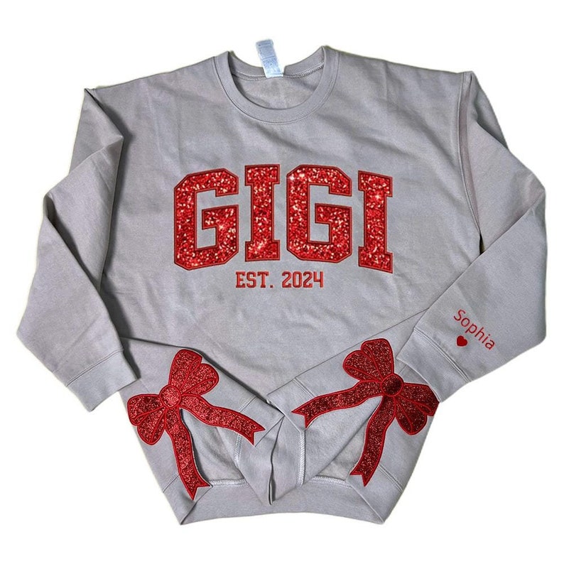 Glitter Gigi Est Claus Embroidered Side Bow Cut-Out Sweatshirt