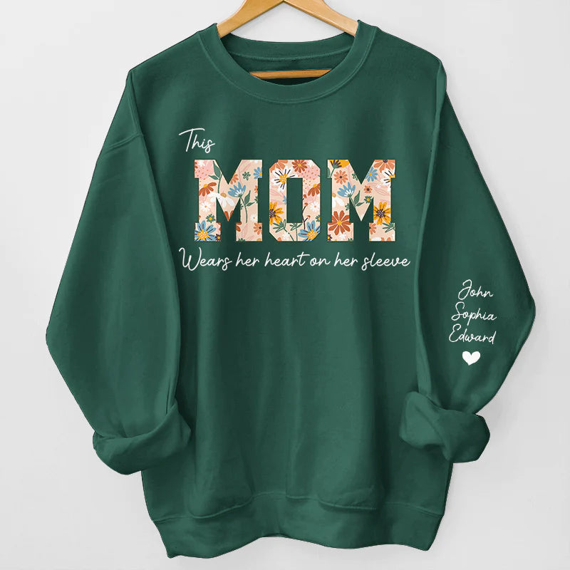 This Mom Wears Her Heart On Her Sleeve - Family Personalized Unisex Sweatshirt With Design On Sleeve - Birthday Gift For Mom, Grandma