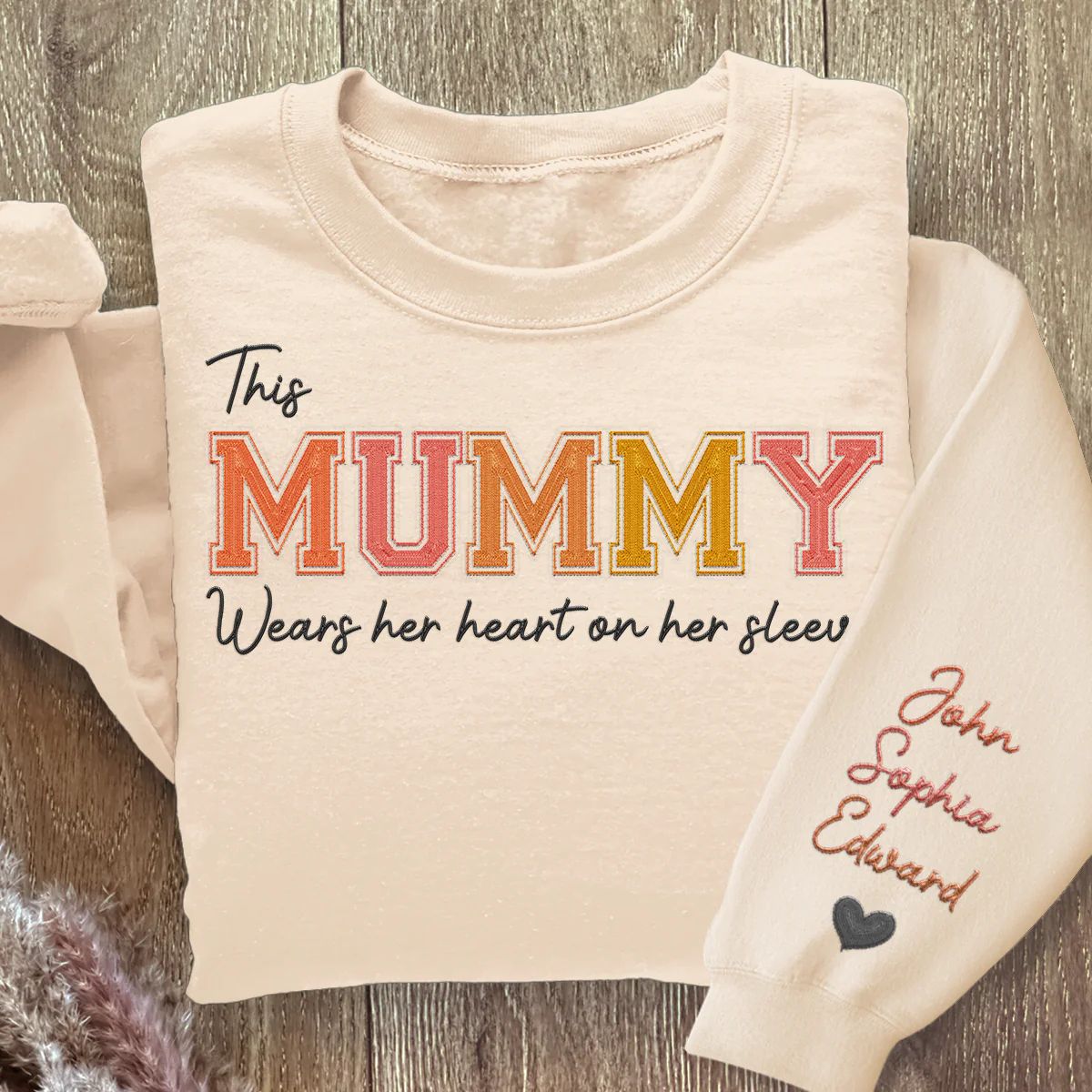 Mommy Wears Her Heart On Her Sleeve - Family Personalized Custom Embroidered Sweatshirt - Gift For Mom, Grandma