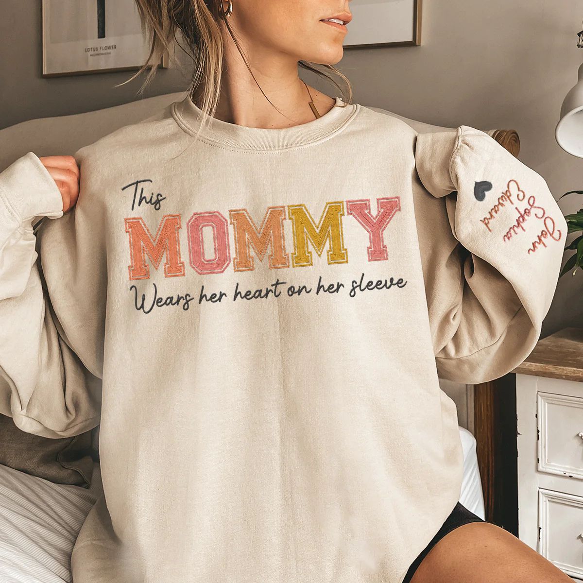 Mommy Wears Her Heart On Her Sleeve - Family Personalized Custom Embroidered Sweatshirt - Gift For Mom, Grandma