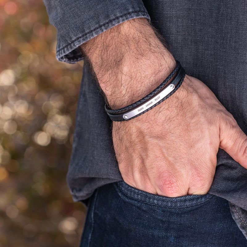 Stacked Black Leather Bracelets with an Engraved Bar